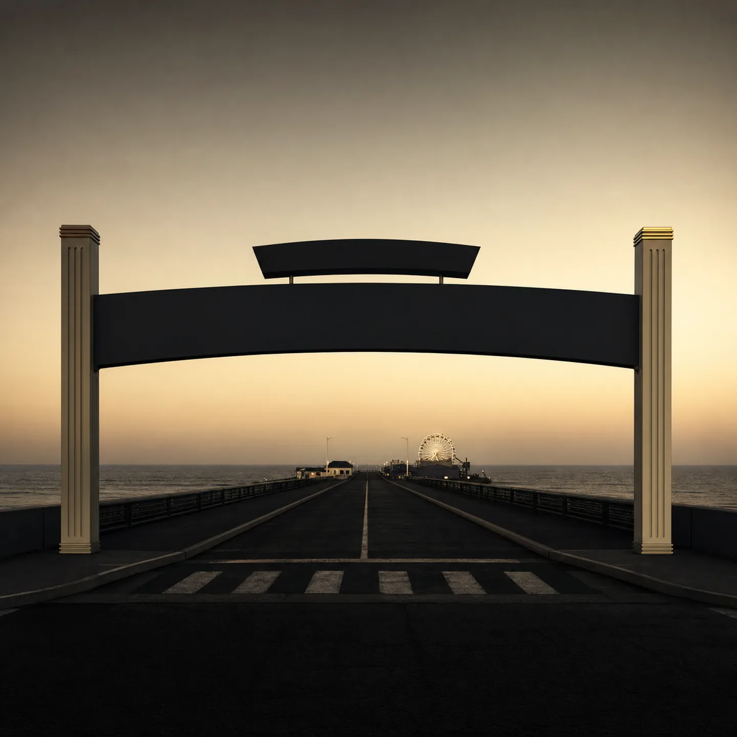 The streamlined entrance to Santa Monica Pier frames the distant Pacific Wheel at dusk.